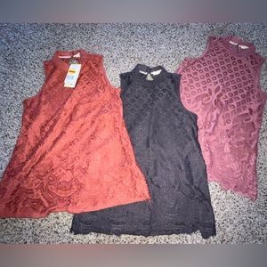 These 3 tanks are “Rewind” brand from kohls. 1 is NWT, the others were worn once
